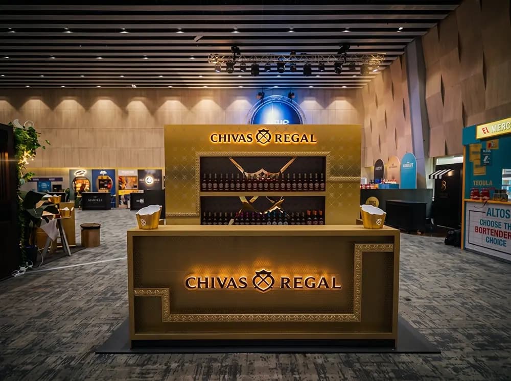 Chivas Regal gold exhibition bar with embossed panelling and backlit display built by Proink
