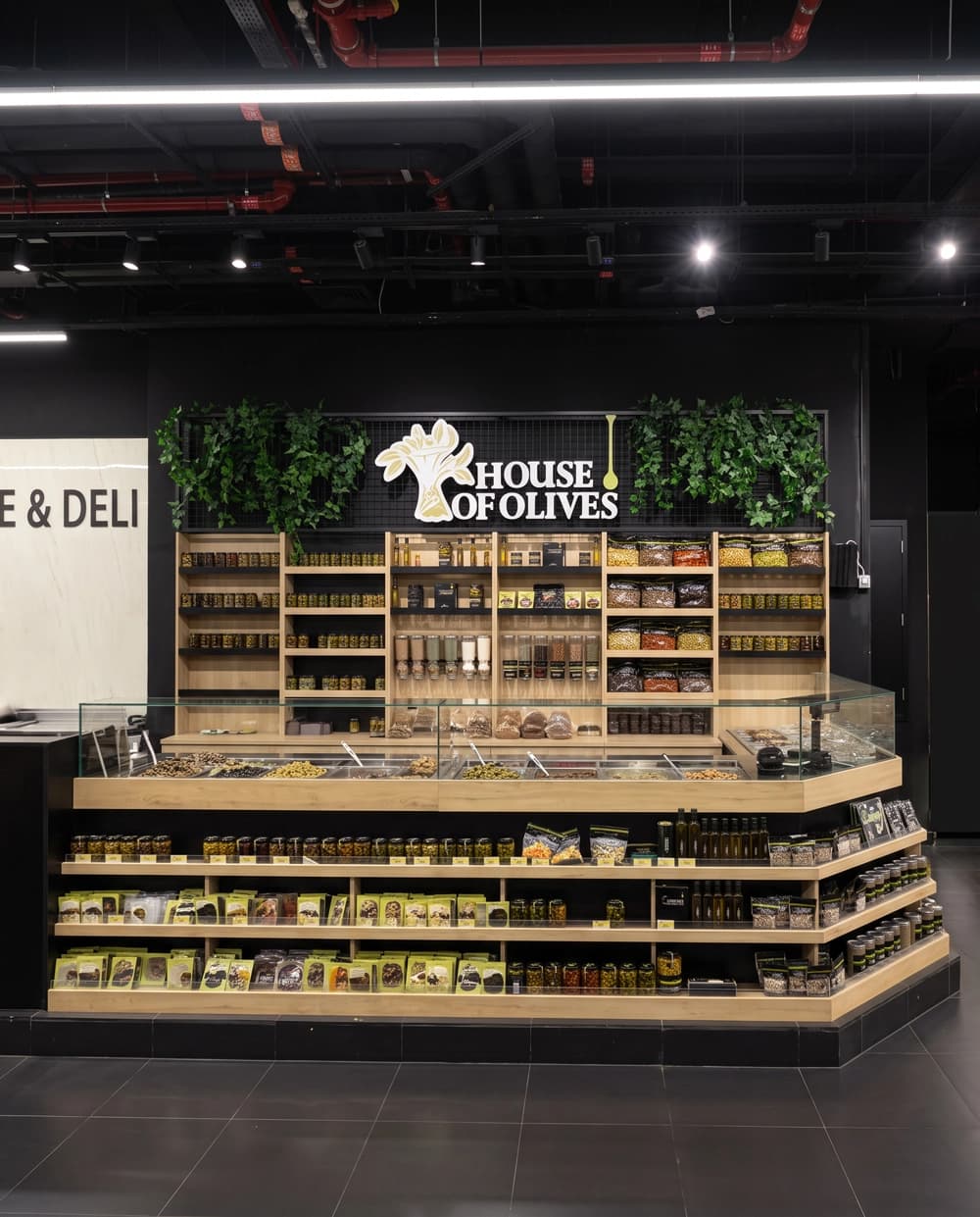 House of Olives shop-in-shop deli counter with timber shelving built by Proink