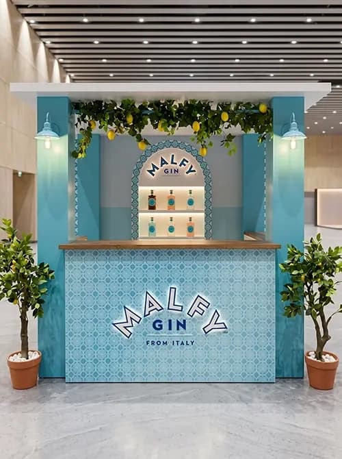 Malfy Gin bar kiosk with tiled panels and lemon trees built by Proink