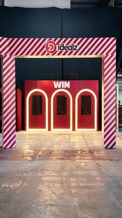 Illuminated three arch prize reveal wall built for the Idealz Christmas event