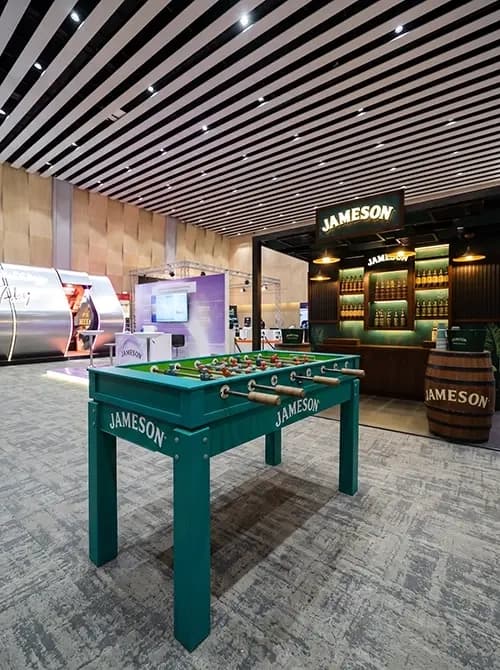 Branded Jameson foosball table installed at the front of the exhibition stand