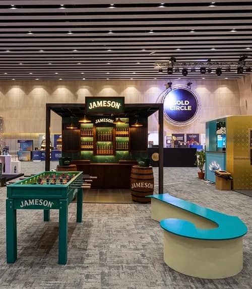 Full view of the Jameson pub-style stand installed in an exhibition hall