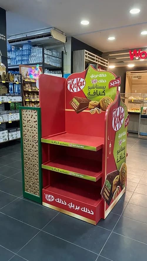 KitKat Ramadan display unit with tiered shelving installed in a supermarket