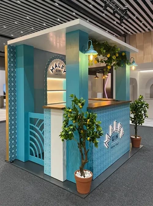 Side view of the Malfy Gin kiosk with fretwork panels and patterned tiling