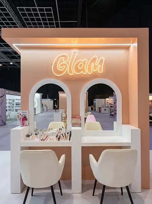 Glam beauty trial station with mirrored arches and product counters at the Mazen stand