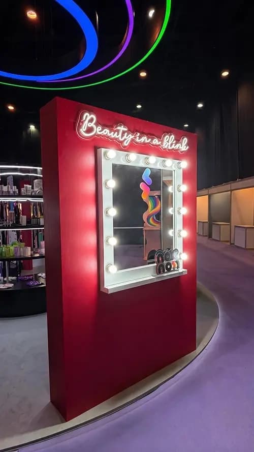 Beauty in a Blink mirror booth with an illuminated vanity mirror built by Proink
